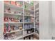 A walk-in pantry with an abundance of shelving at 9137 E Odessa St, Mesa, AZ 85207
