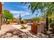 Lounge and relax in the outdoor pool area with desert landscaping and ample patio space at 9137 E Odessa St, Mesa, AZ 85207
