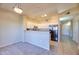 Open floorplan with a view of the kitchen from the dining area at 920 E Devonshire Ave # 4021, Phoenix, AZ 85014