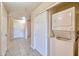 Hallway with washer and dryer hookups in a closet at 920 E Devonshire Ave # 4021, Phoenix, AZ 85014
