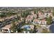 Community featuring condos, a pool, mature landscaping and outdoor seating areas at 9705 E Mountain View Rd # 1050, Scottsdale, AZ 85258
