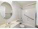 Bathroom with large mirror and shower and bath combo with silver hardware at 9705 E Mountain View Rd # 1050, Scottsdale, AZ 85258