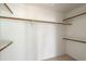 Walk-in closet features built-in shelving for optimal organization at 9705 E Mountain View Rd # 1050, Scottsdale, AZ 85258