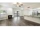 Bright living room featuring a fireplace, sliding glass doors, and modern finishes at 9705 E Mountain View Rd # 1050, Scottsdale, AZ 85258