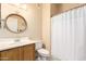 Bathroom featuring a vanity sink, toilet, and shower with white curtain at 9750 N Monterey Dr # 21, Fountain Hills, AZ 85268