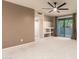 Relaxing primary bedroom with carpeted floors, ceiling fan, and access to the outdoor patio at 9750 N Monterey Dr # 21, Fountain Hills, AZ 85268