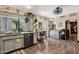 Bright, spacious kitchen with wood floors and updated appliances; perfect for cooking and gathering at 11021 N 64Th Ln, Glendale, AZ 85304
