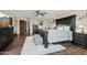 Elegant main bedroom features a spacious layout, dark furniture and plush carpet at 11021 N 64Th Ln, Glendale, AZ 85304