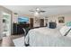 Comfortable main bedroom features an abundance of space, dark furniture and plush carpet at 11021 N 64Th Ln, Glendale, AZ 85304