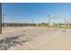 Outdoor basketball court area offers a recreational space for residents to enjoy the outdoors at 11705 W Luxton Ln, Avondale, AZ 85323