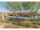 Community ramada with seating, picnic tables and barbeque facilities for outdoor gatherings at 11705 W Luxton Ln, Avondale, AZ 85323