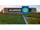 Alamar community entrance sign with manicured landscaping, promoting a welcoming environment at 11705 W Luxton Ln, Avondale, AZ 85323