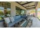 Comfortable outdoor seating area with a fire pit and views of the pool at 11705 W Luxton Ln, Avondale, AZ 85323