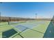 Multiple well-maintained outdoor pickleball courts with green and blue surfaces, perfect for recreational play at 11705 W Luxton Ln, Avondale, AZ 85323