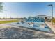 Modern playground with climbing structures and soft surfacing offers a safe and engaging space for activities at 11705 W Luxton Ln, Avondale, AZ 85323