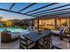 A poolside dining and lounge area at 11705 W Luxton Ln, Avondale, AZ 85323
