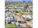Aerial view of a well-manicured home with a covered patio and solar panels in a residential neighborhood at 1422 E Windsor Ave, Phoenix, AZ 85006