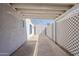 Backyard featuring an exterior building, concrete flooring, and decorative lattice at 1422 E Windsor Ave, Phoenix, AZ 85006