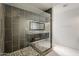 Modern bathroom with a glass-enclosed shower, mosaic flooring, and dual vanities at 1422 E Windsor Ave, Phoenix, AZ 85006