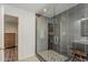 Modern bathroom features a glass shower with gray tiling and decorative mosaic accents at 1422 E Windsor Ave, Phoenix, AZ 85006