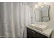 Bathroom featuring a sink with a modern faucet and a gray vanity at 1422 E Windsor Ave, Phoenix, AZ 85006