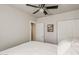 Minimalist bedroom with a comfortable white bed and ample closet space at 1422 E Windsor Ave, Phoenix, AZ 85006
