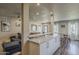 Open-concept kitchen with marble countertops connecting to dining and living spaces, promoting easy interaction at 1422 E Windsor Ave, Phoenix, AZ 85006
