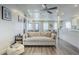 Bright living room area showing a cozy couch, dining area and open-concept layout at 1422 E Windsor Ave, Phoenix, AZ 85006