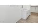Bathroom featuring double sinks and tile floors at 35445 N Seedling St, San Tan Valley, AZ 85144