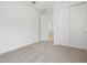 Bedroom with carpeted floors, freshly painted walls and a closet with sliding doors at 35445 N Seedling St, San Tan Valley, AZ 85144