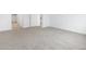 A spacious bedroom features neutral-toned walls and soft carpet at 35445 N Seedling St, San Tan Valley, AZ 85144