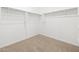 Bright walk-in closet with rod and shelf provides ample storage space in this new home at 35445 N Seedling St, San Tan Valley, AZ 85144