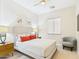 Bedroom featuring a queen bed, carpet, lamps and art at 4571 S Pinaleno W Dr, Chandler, AZ 85249