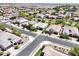 An aerial view of a residential area with neatly planned streets and well-maintained landscaping at 4571 S Pinaleno W Dr, Chandler, AZ 85249