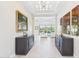Elegant foyer featuring hardwood floors, stylish decor, and an open view to the living area at 4571 S Pinaleno W Dr, Chandler, AZ 85249