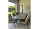 Outdoor patio with a large dining table and comfortable seating for entertaining at 4571 S Pinaleno W Dr, Chandler, AZ 85249