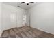 This bedroom features neutral carpet and easy access to the ensuite bathroom at 5750 S 250Th Dr, Buckeye, AZ 85326
