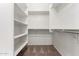 Walk-in closet with shelving and hanging space for ample storage and organization at 5750 S 250Th Dr, Buckeye, AZ 85326
