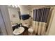 Bathroom offers a single sink vanity and a shower-tub combo at 740 W Elm St # 264, Phoenix, AZ 85013