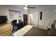 Bedroom featuring a workspace, closet, and neutral walls and flooring at 740 W Elm St # 264, Phoenix, AZ 85013