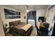 This bedroom offers a ceiling fan and natural light from the window at 740 W Elm St # 264, Phoenix, AZ 85013