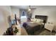 Bedroom offers a plush bed, and natural light from the window at 740 W Elm St # 264, Phoenix, AZ 85013