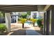 Outdoor community pool with palm trees and seating at 740 W Elm St # 264, Phoenix, AZ 85013