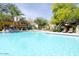 Large community pool with ample lounge chairs and seating at 11375 E Sahuaro Dr # 1107, Scottsdale, AZ 85259