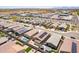Expansive aerial view of a residential neighborhood featuring many single-story homes at 12474 W Glenn Ct, Glendale, AZ 85307
