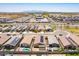 Expansive aerial view of a residential neighborhood featuring many single-story homes at 12474 W Glenn Ct, Glendale, AZ 85307