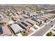 Expansive aerial view of a residential neighborhood featuring many single-story homes at 12474 W Glenn Ct, Glendale, AZ 85307