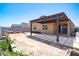 Backyard features a covered patio with pergola at 12474 W Glenn Ct, Glendale, AZ 85307