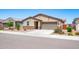 Charming single-story home featuring a two-car garage and low-maintenance desert landscaping at 12474 W Glenn Ct, Glendale, AZ 85307