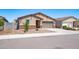 Charming single-story home featuring a two-car garage and low-maintenance desert landscaping at 12474 W Glenn Ct, Glendale, AZ 85307